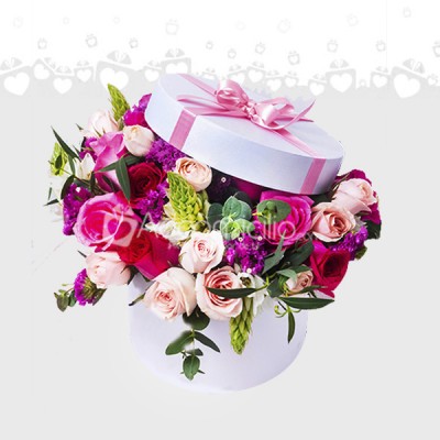 Arreglo Floral en cilindro blanco Regalo día de la mujer